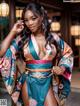A woman in a kimono posing for a picture.